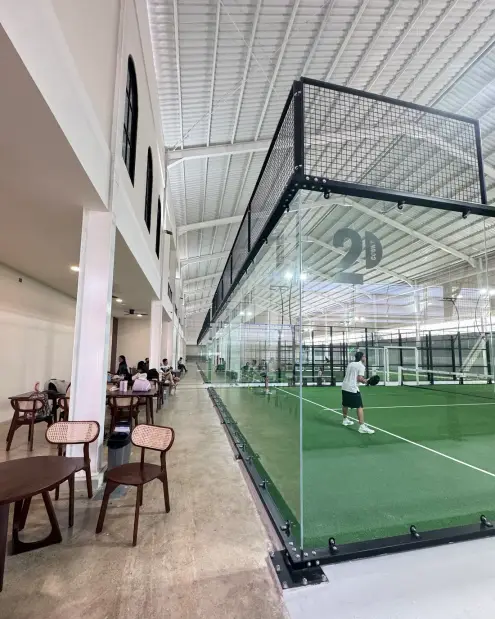 Tables beside the courts
